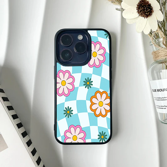Phone case with a blue and white wavy checkerboard pattern and scattered retro daisies in pink and orange.
